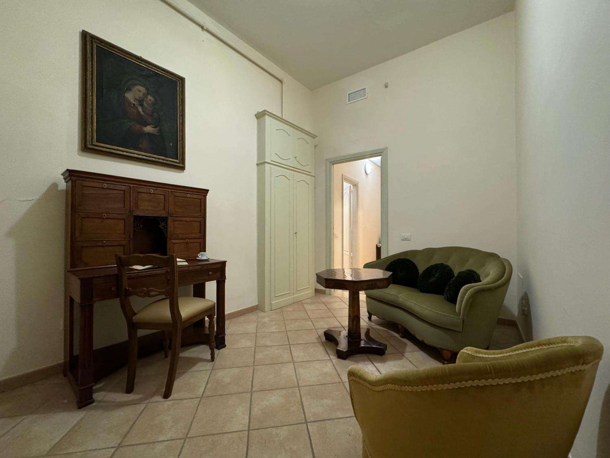 فندق Monastero Ss. Annunziata تودي المظهر الخارجي الصورة The living room of the apartment