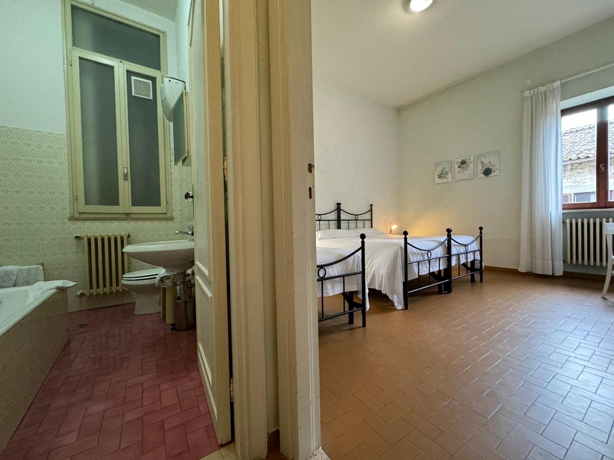 فندق Monastero Ss. Annunziata تودي الغرفة الصورة A typical room at the San Pio X Seminary