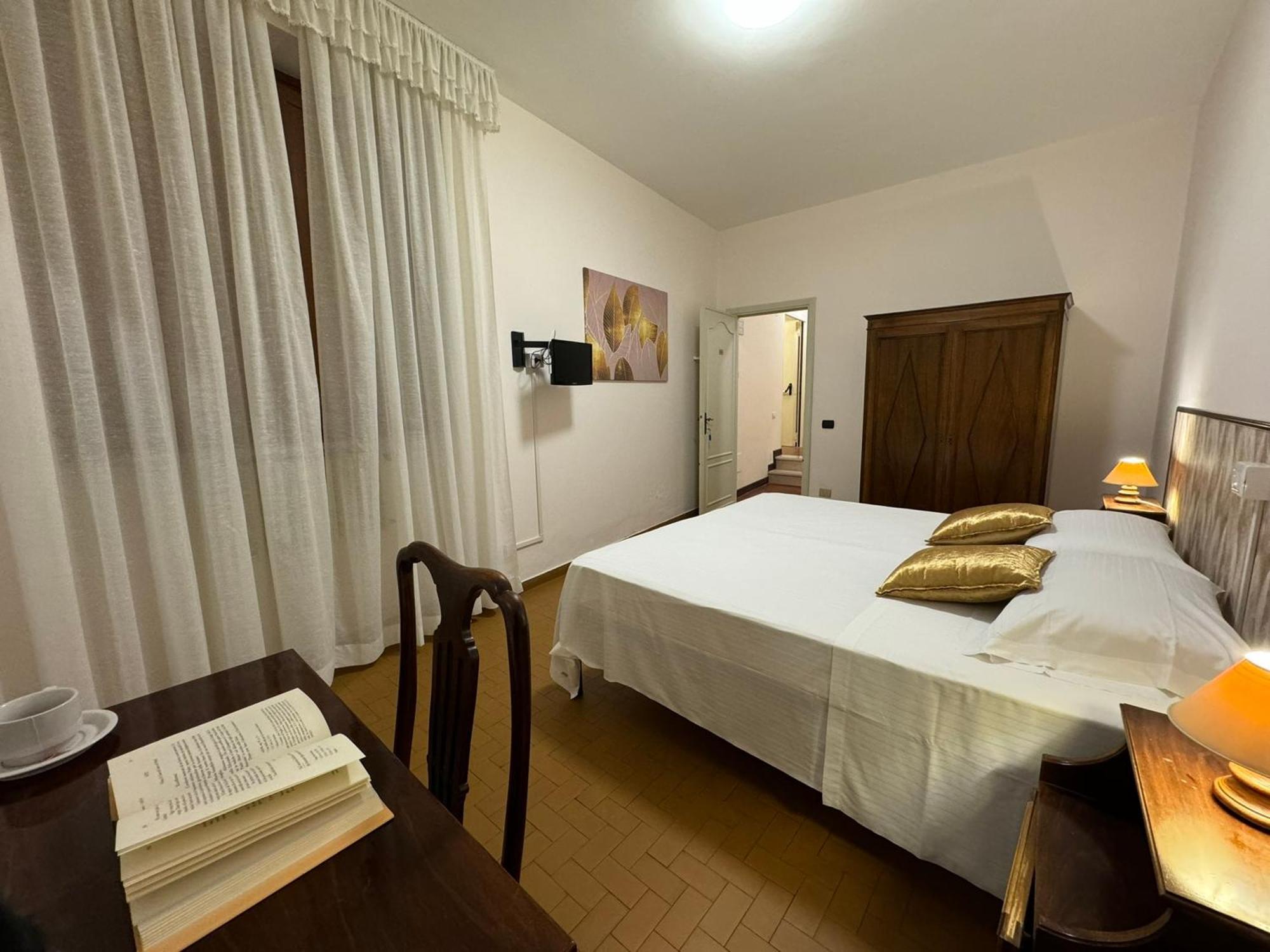 فندق Monastero Ss. Annunziata تودي الغرفة الصورة A bedroom in Italy